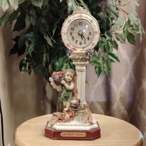 Vintage Clock with Cherub Carrying Fruit
